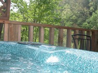 Log Cabin with hot tub.